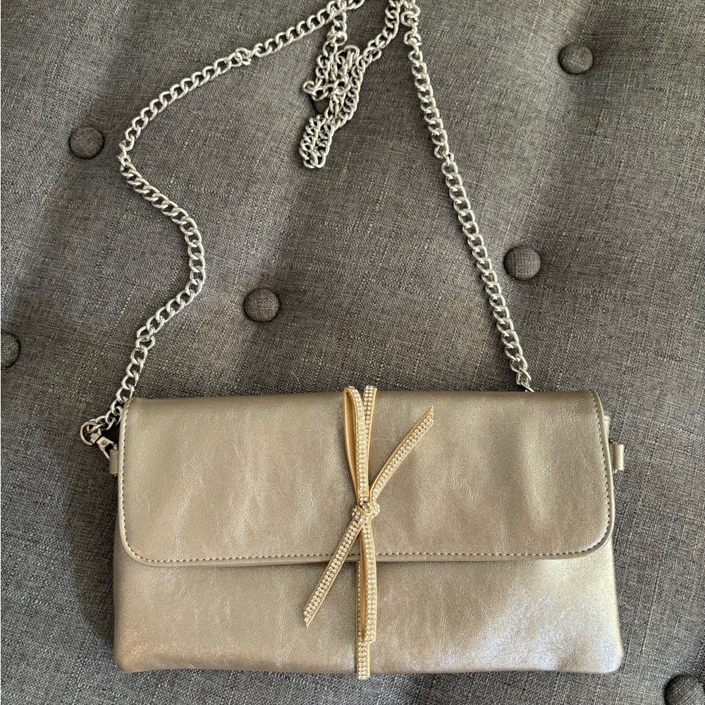 Dressy clutch/crossbody. Color is more pewter